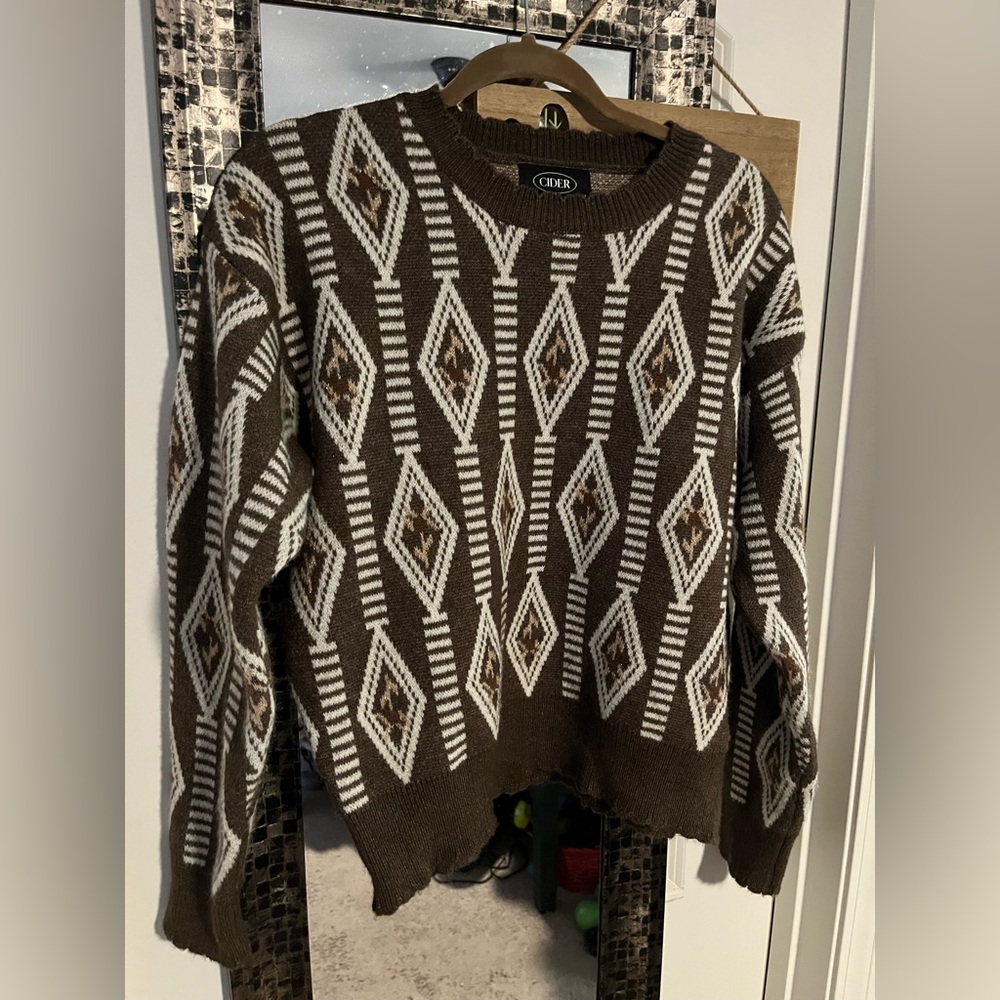 Beautiful sweater with a twist on a classic design. Very nice.